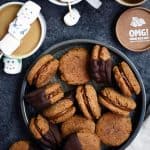 Overhead of hot cocoa gingerbread sandwich cookies
