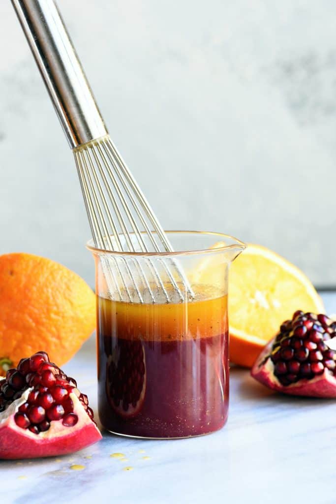 Side view of citrus pomegranate vinaigrette