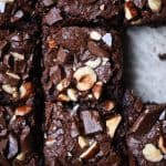 Overhead of tahini hazelnut brownies sliced into squares