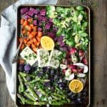 Sheet pan of rainbow roasted spring vegetables and tofu
