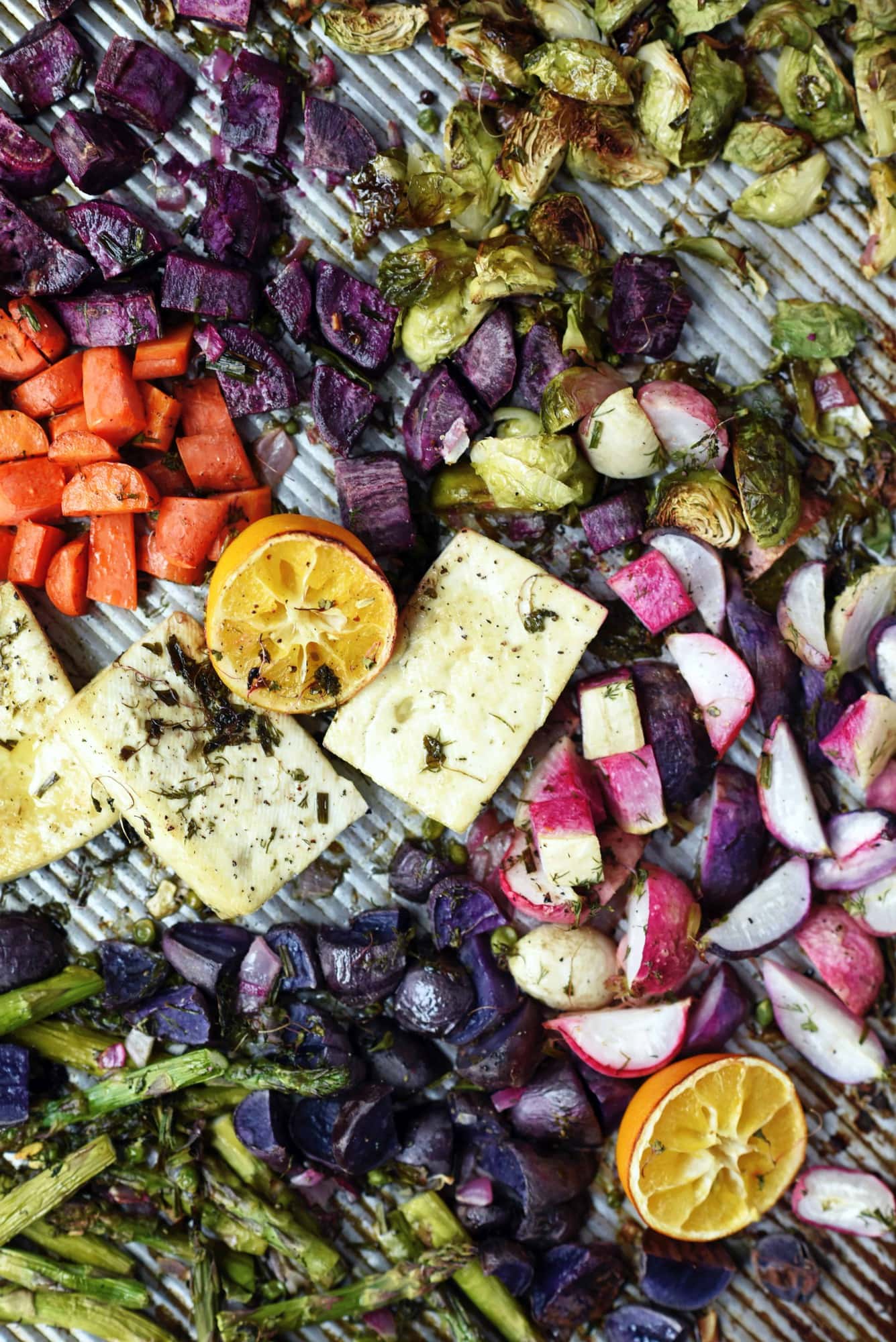 Sheet pan of rainbow roasted spring vegetables and tofu