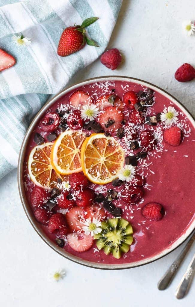 Overhead of rhubarb berry smoothie bowl