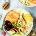 Overhead of vegan peach coconut yogurt bowl