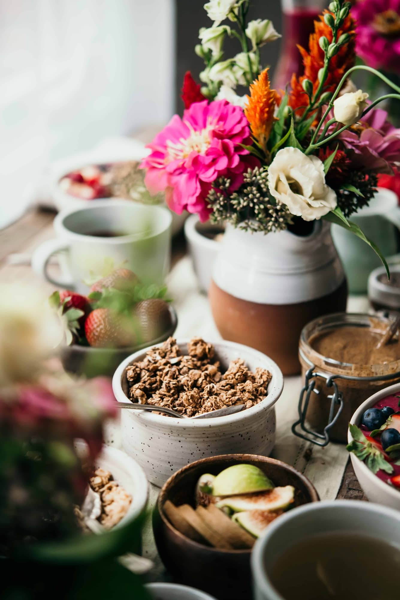 Side view of breakfast tablescape with granola