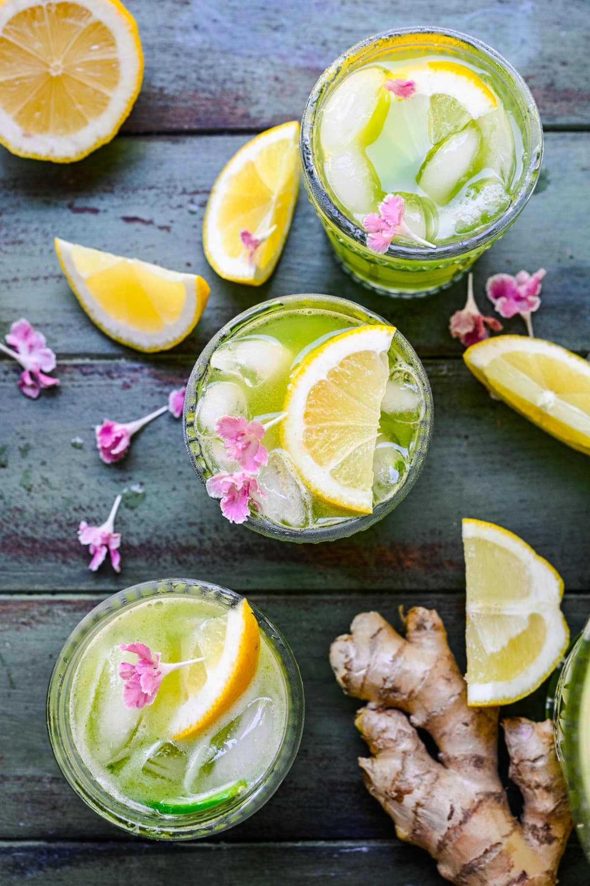 Overhead shot of 3 glasses of ginger lemonade.