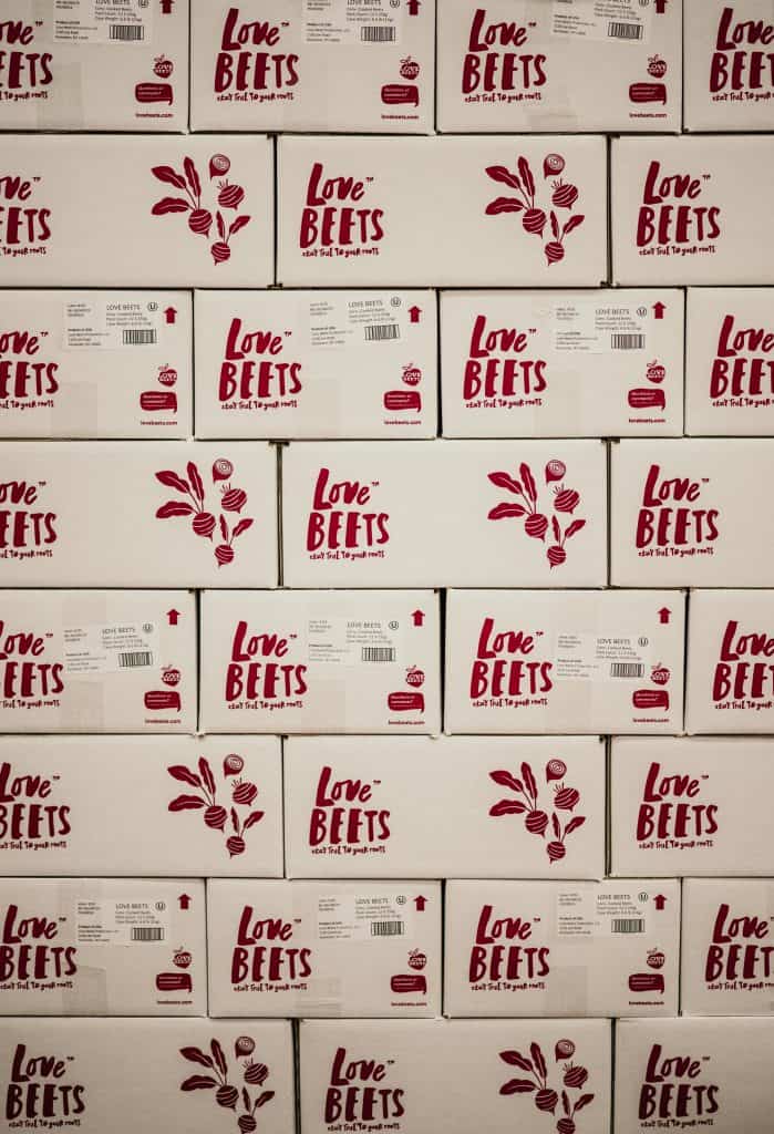Boxes of Love Beets products in their factory