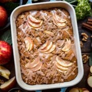 Overhead view of apple walnut cake in a baking dish.