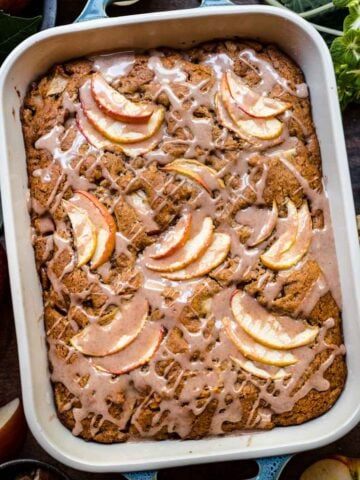 Overhead view of apple walnut cake in a baking dish.