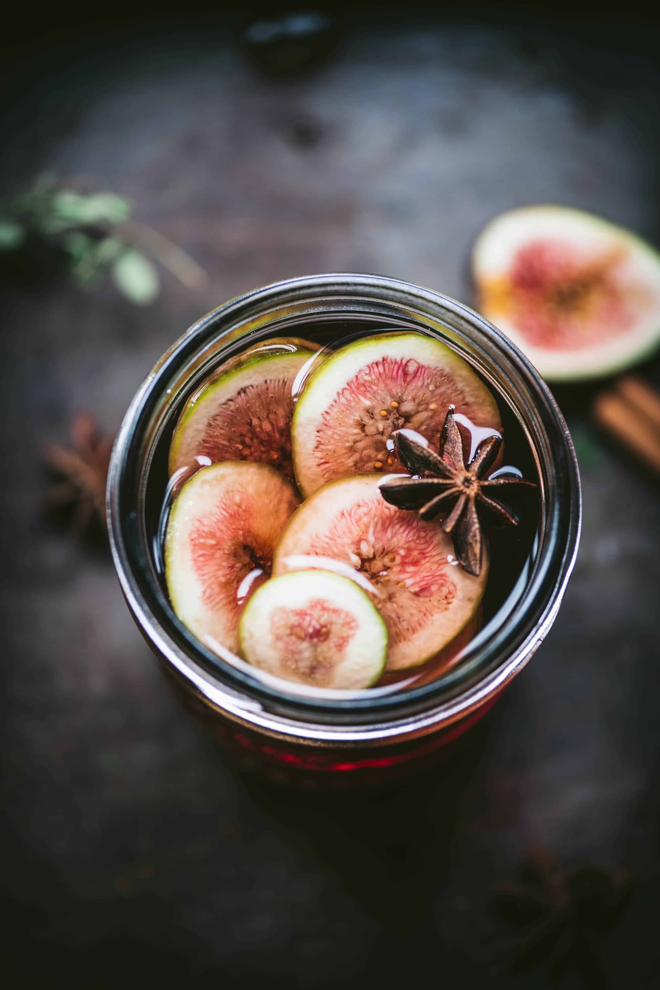 Close up of Fig infused vodka with star anise and cinnamon