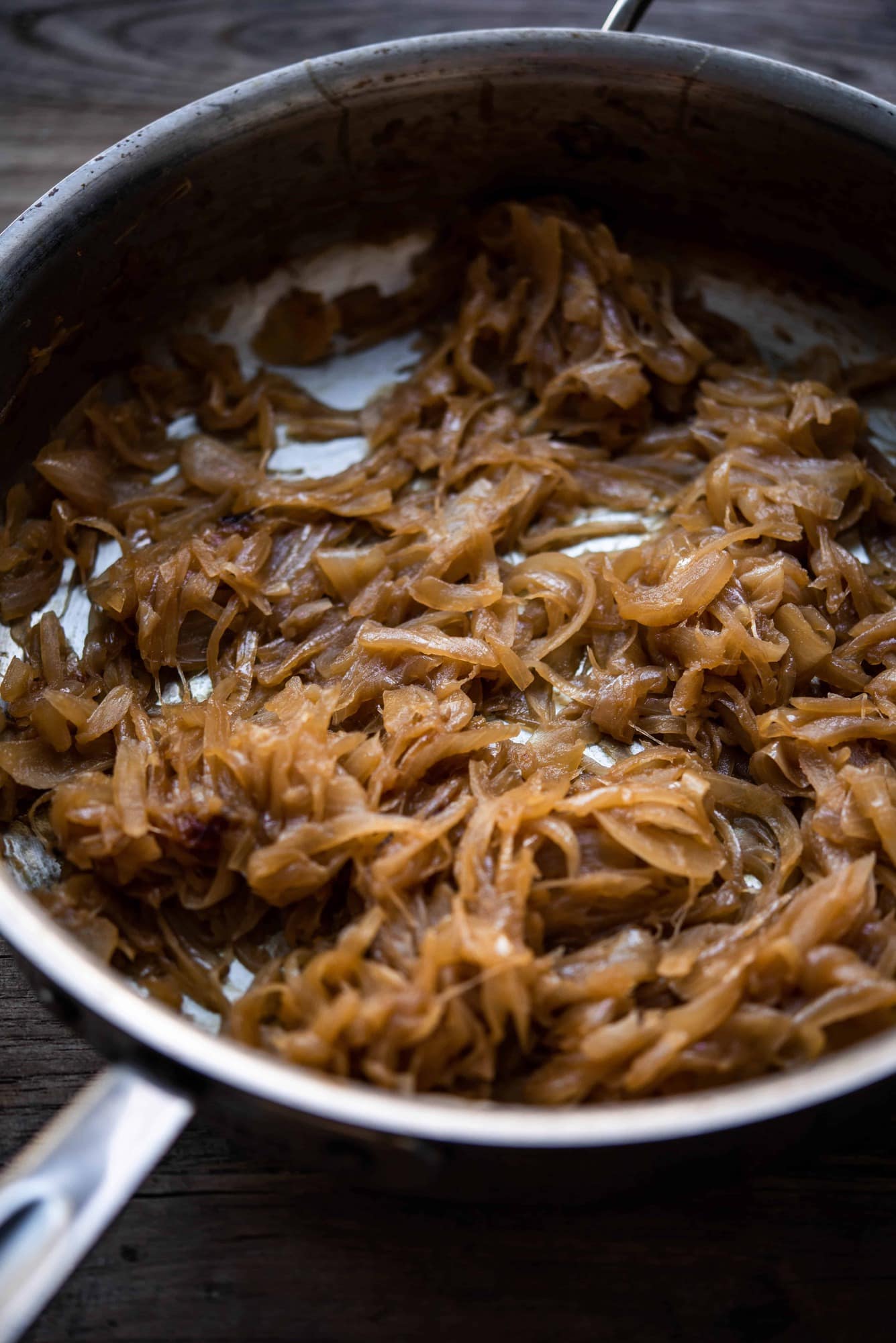 Close up view of caramelized onions in a pan