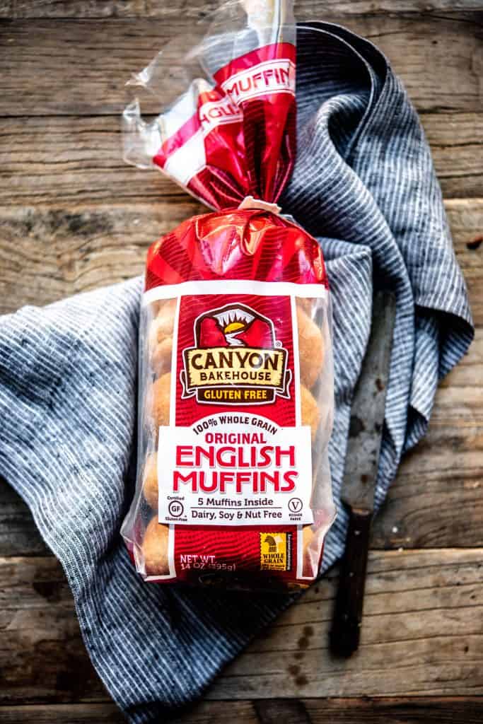 Overhead of a loaf of Canyon Gluten Free English Muffins on a wood table