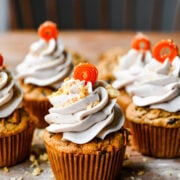 Front view of vegan carrot cake cupcakes.