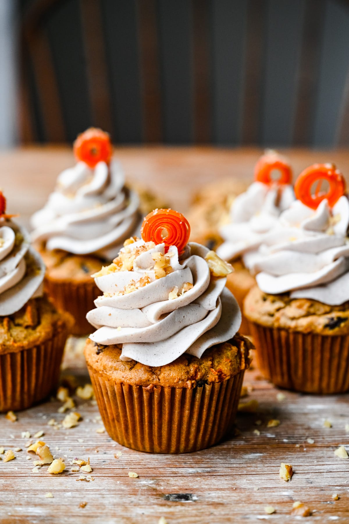 Front view of vegan carrot cake cupcakes.