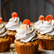 Front view of carrot cake cupcakes.