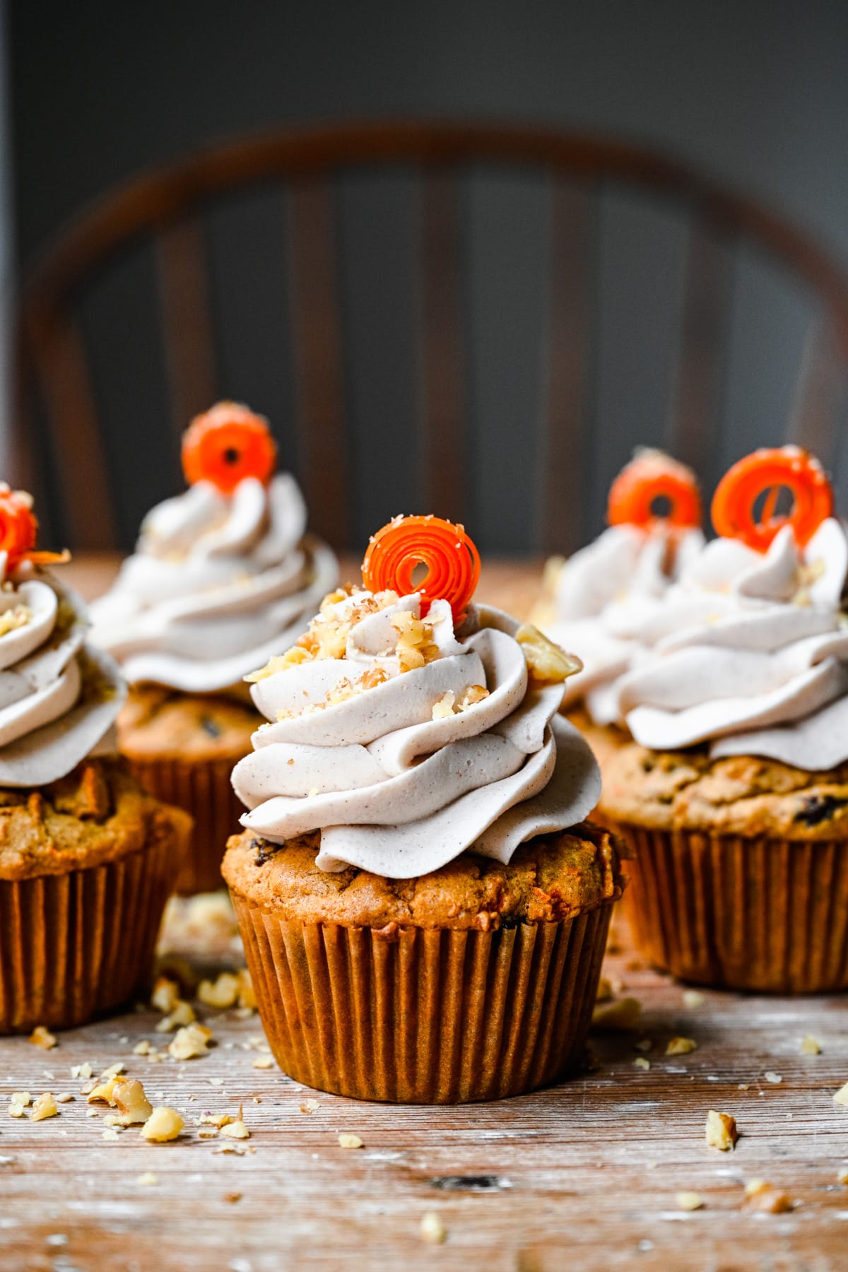 Front view of carrot cake cupcakes.