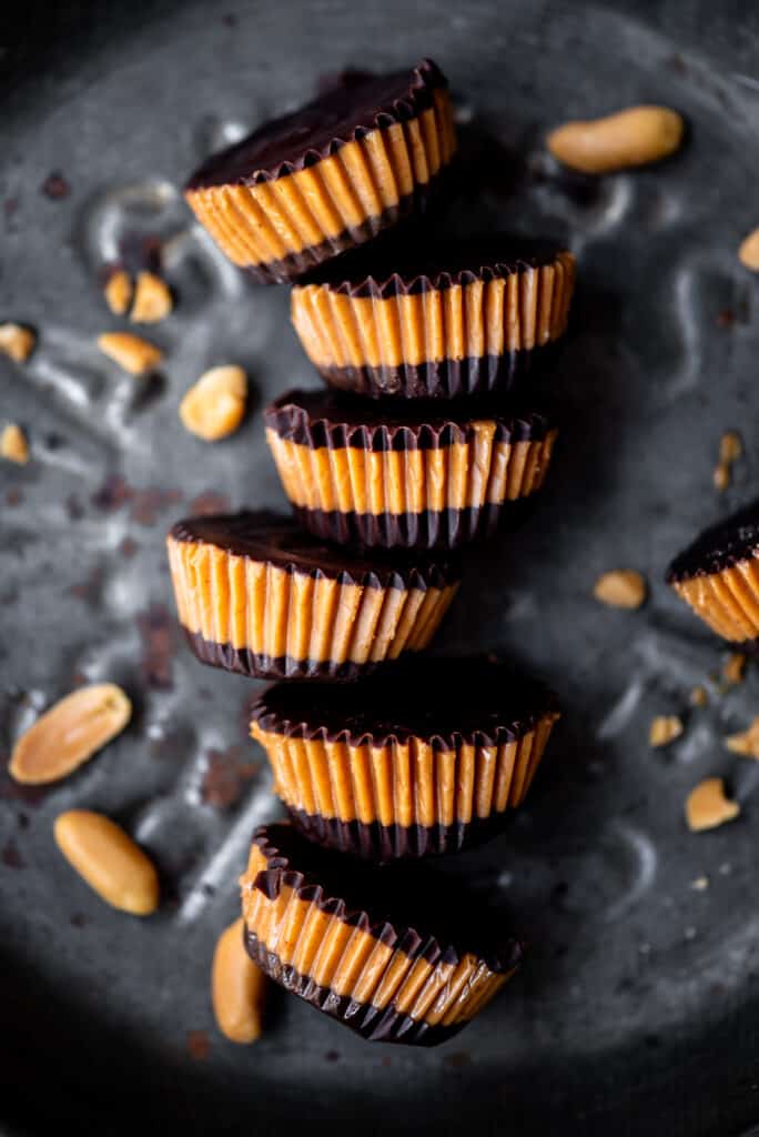 Close up Overhead of vegan peanut butter cups on an antique tray