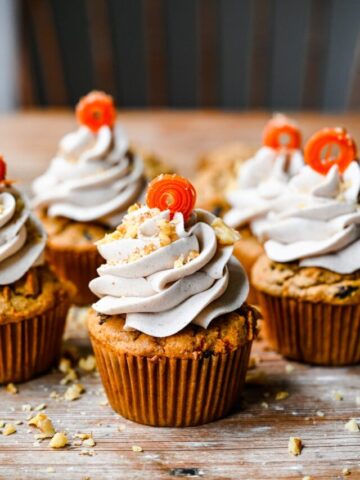 Front view of vegan carrot cake cupcakes.