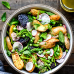 Overhead view of Spring Potato Salad in white bowl