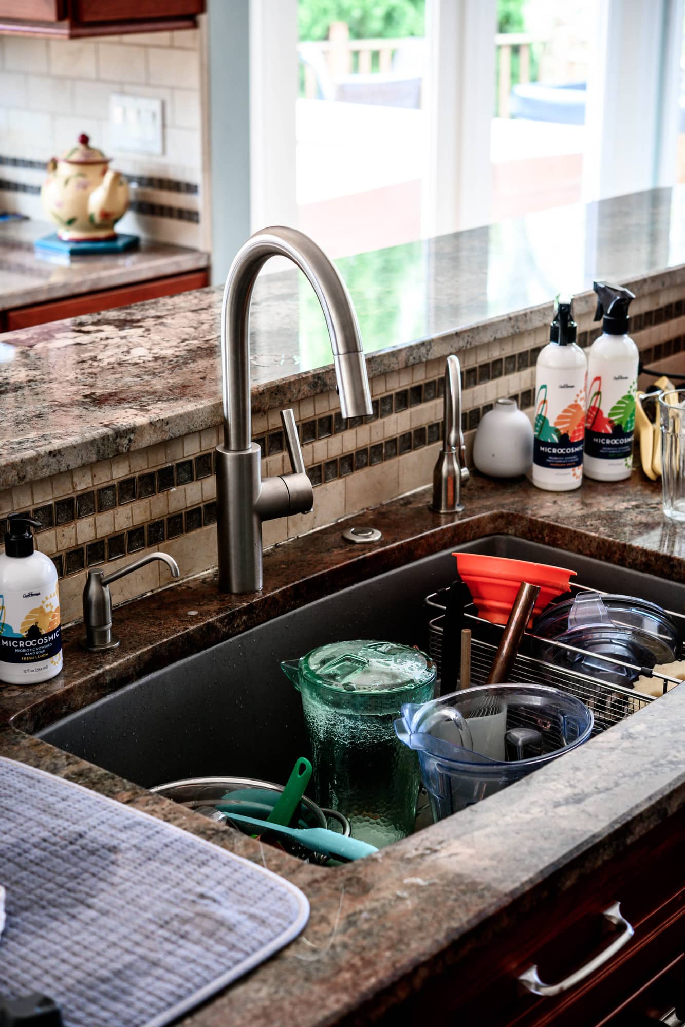 Side view of very messy kitchen sink