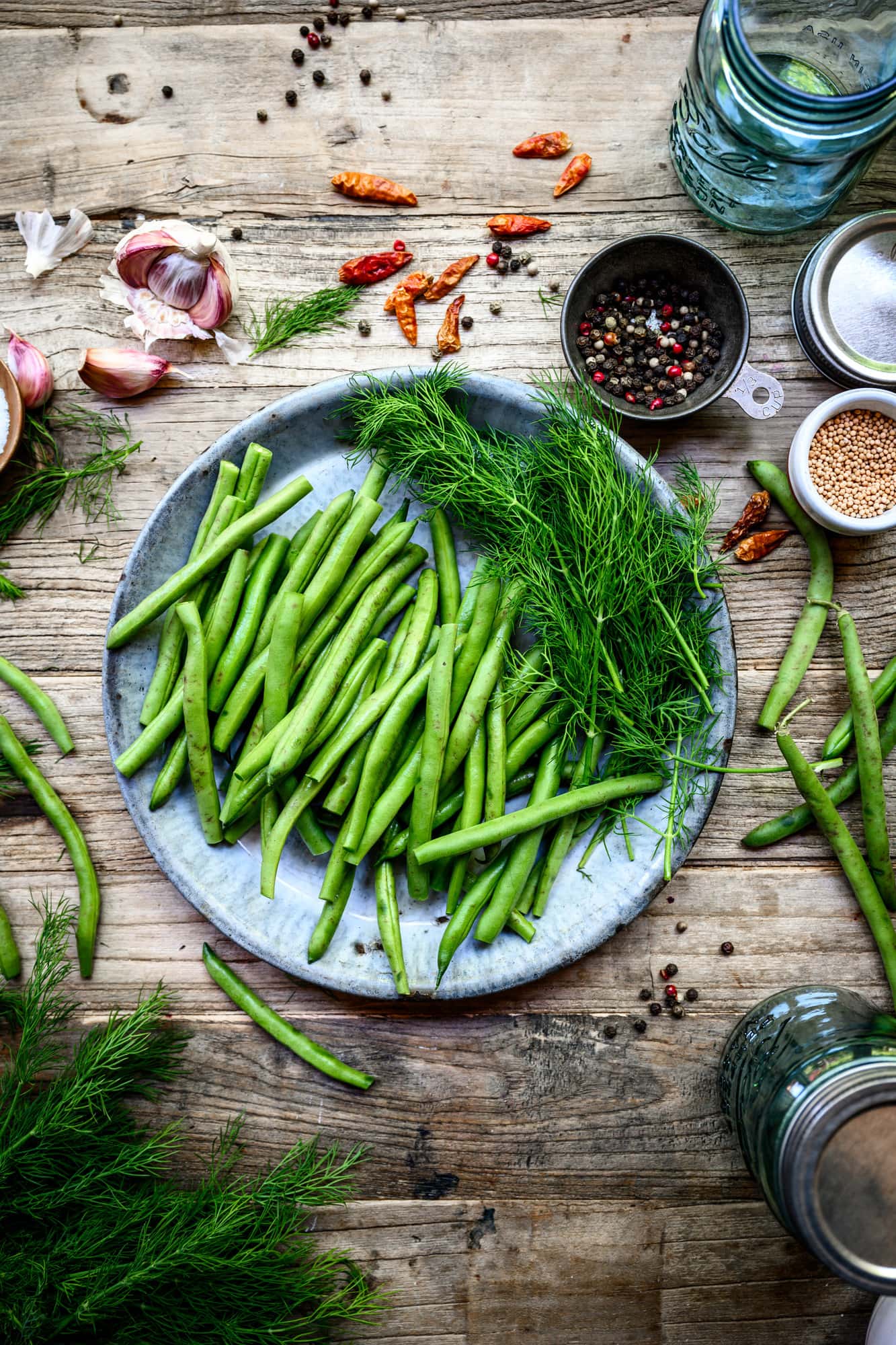 Overhead view of ingredients to make spicy pickled dilly beans