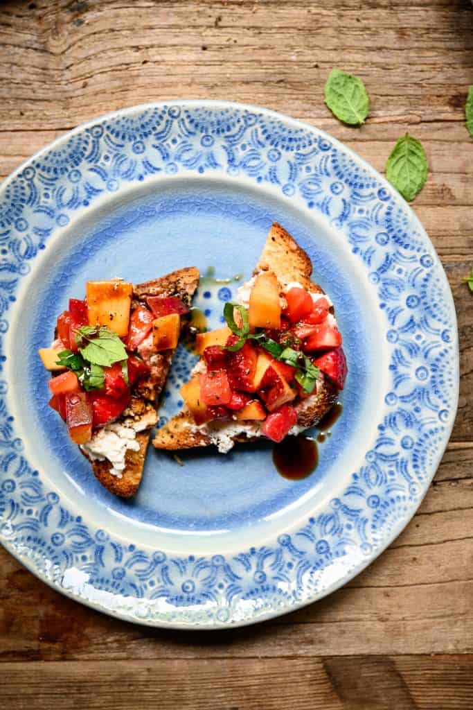 Summer bruschetta on a blue plate