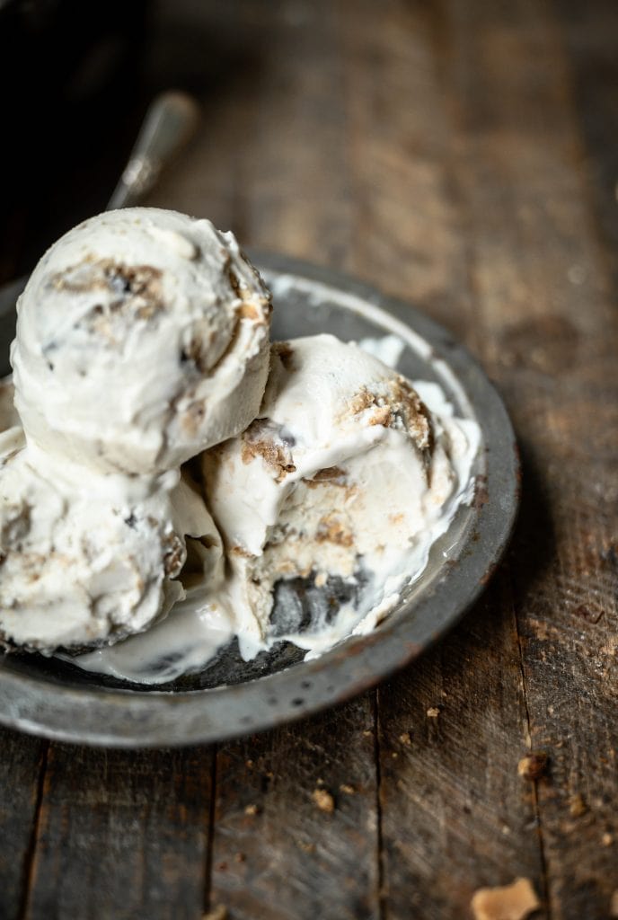 Scoops of vegan cookie dough ice cream on a plate