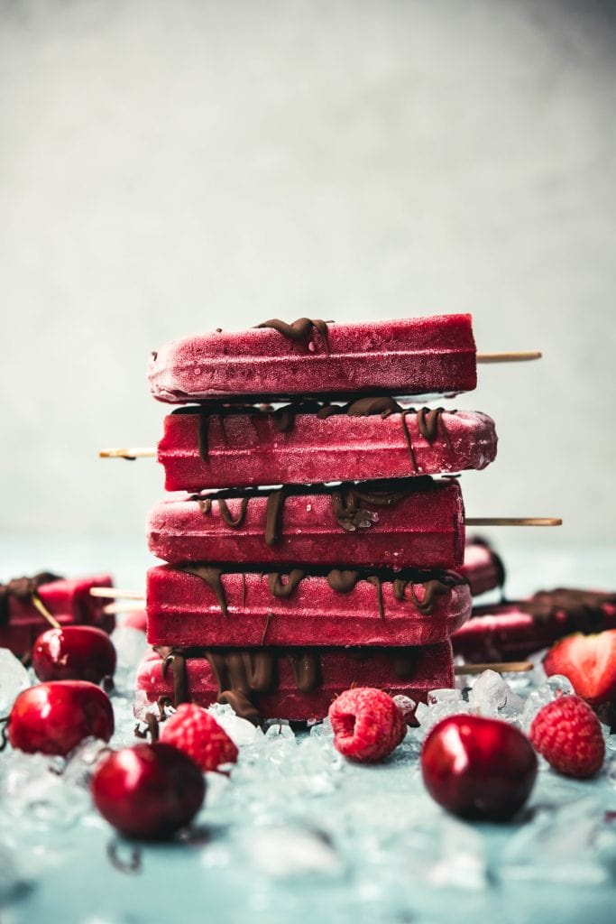 Side view of stack of berry popsicles