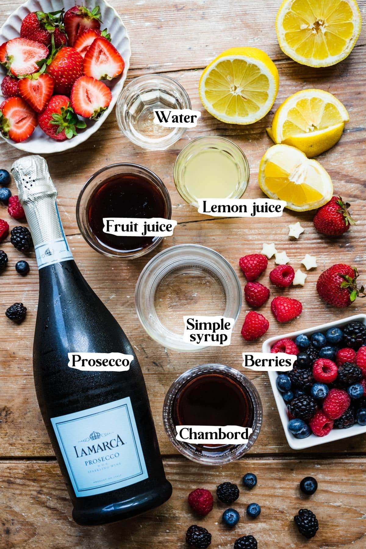 Overhead view of sparkling berry sangria ingredients.