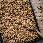 Overhead view of best easy gluten-free granola on an antique sheet pan
