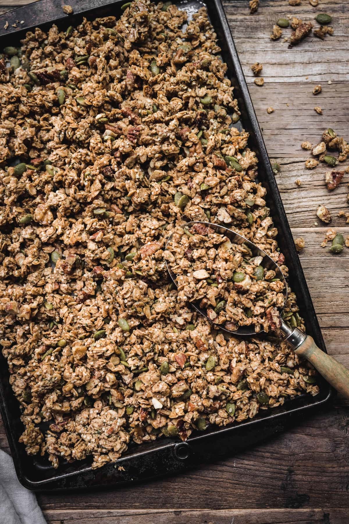 Overhead view of best easy gluten-free granola on an antique sheet pan