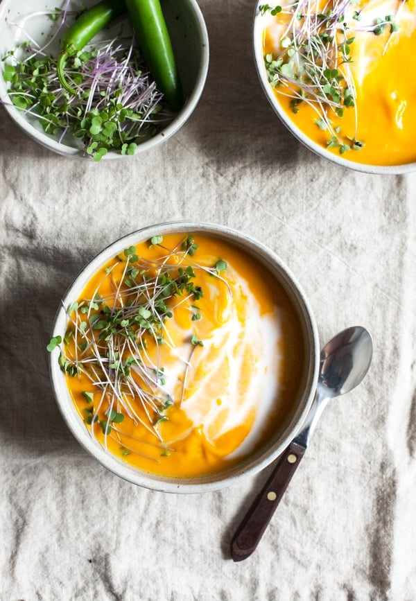 overhead of dairy free thai coconut carrot lemongrass soup