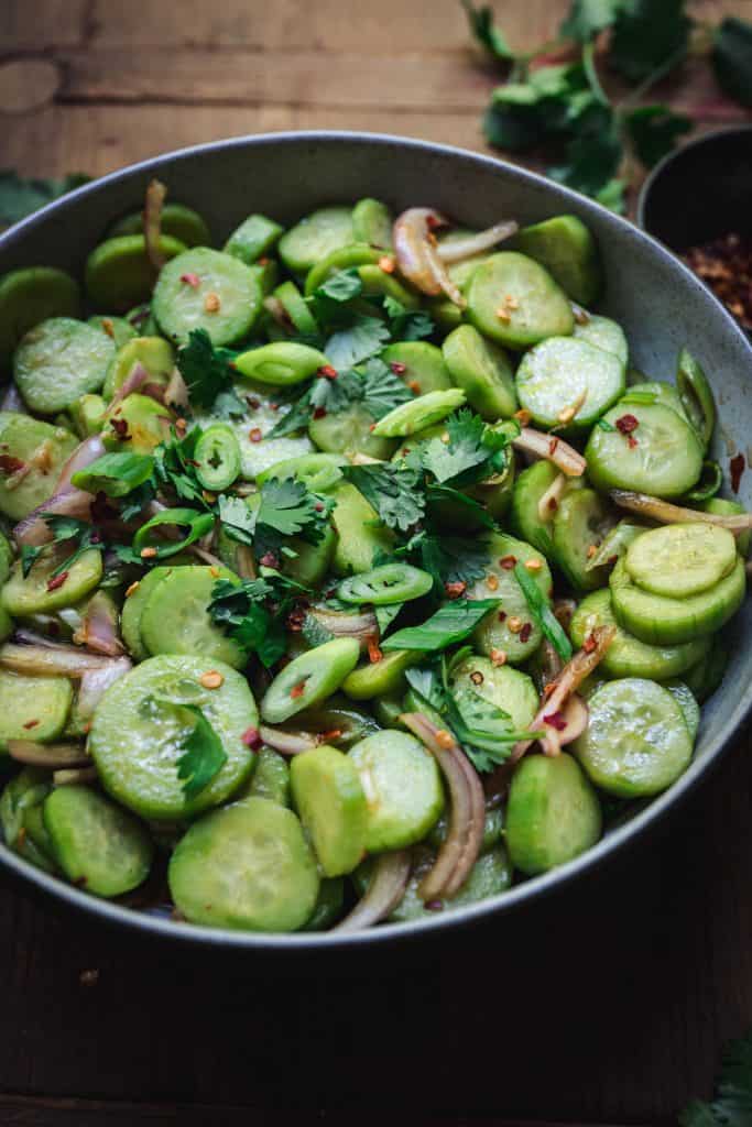 Overhead view of aisan cucumber salad in a bowl