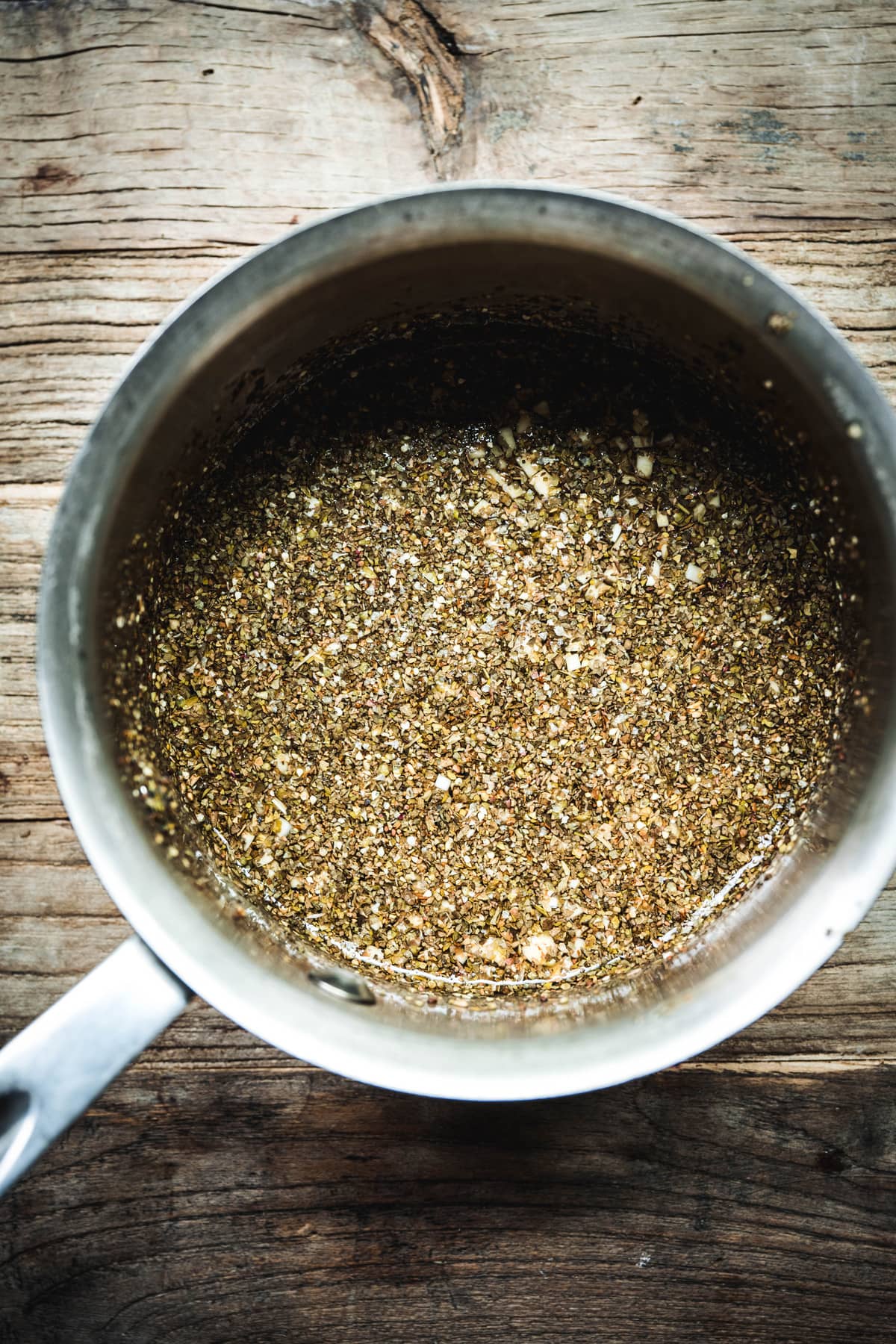 overhead view of pickling seasonings in a pot