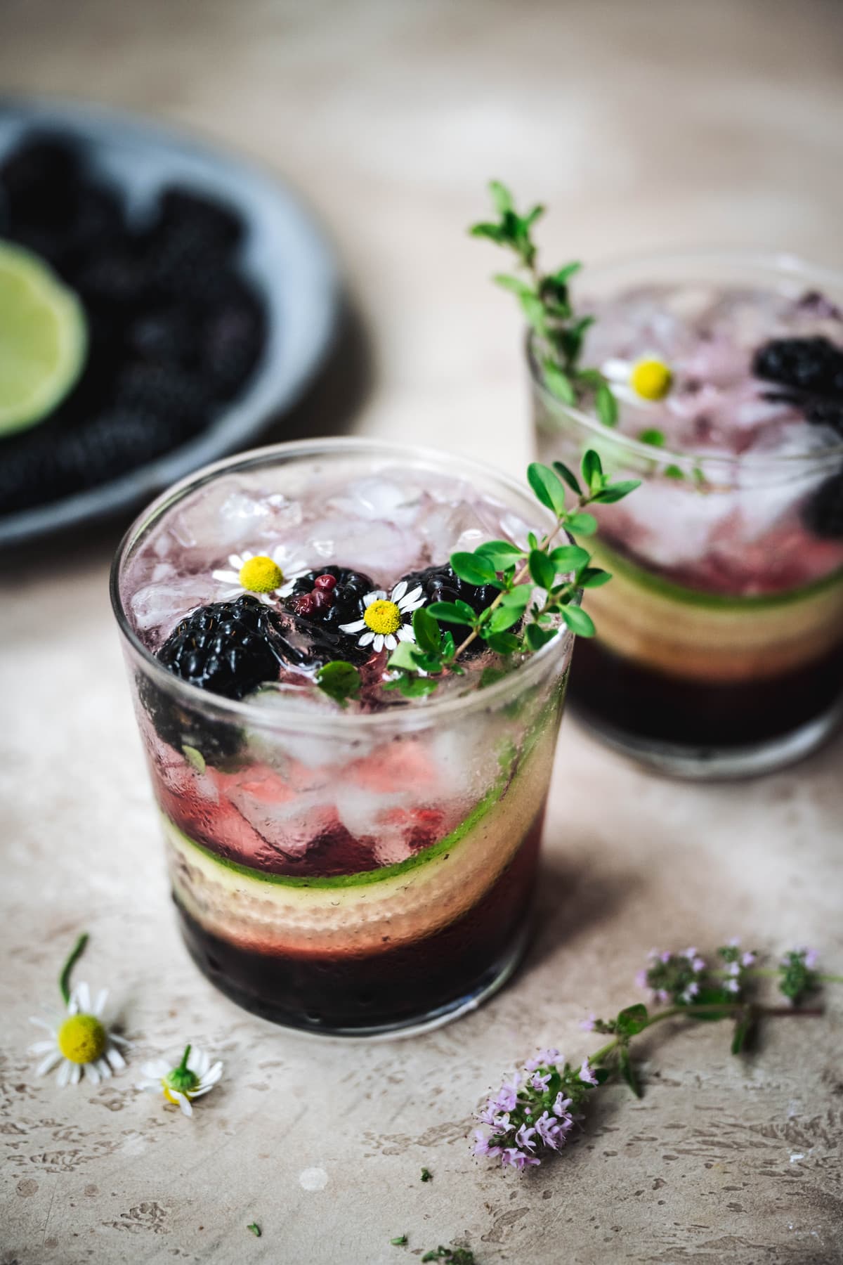 side view of blackberry cucumber cocktails