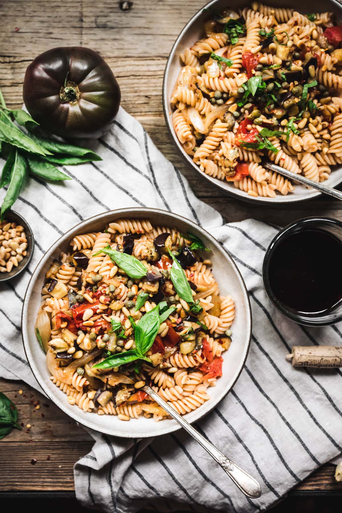 overhead of two bowls of homemade vegan eggplant pasta