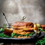 side view of indian-spiced veggie burger with mango chutney
