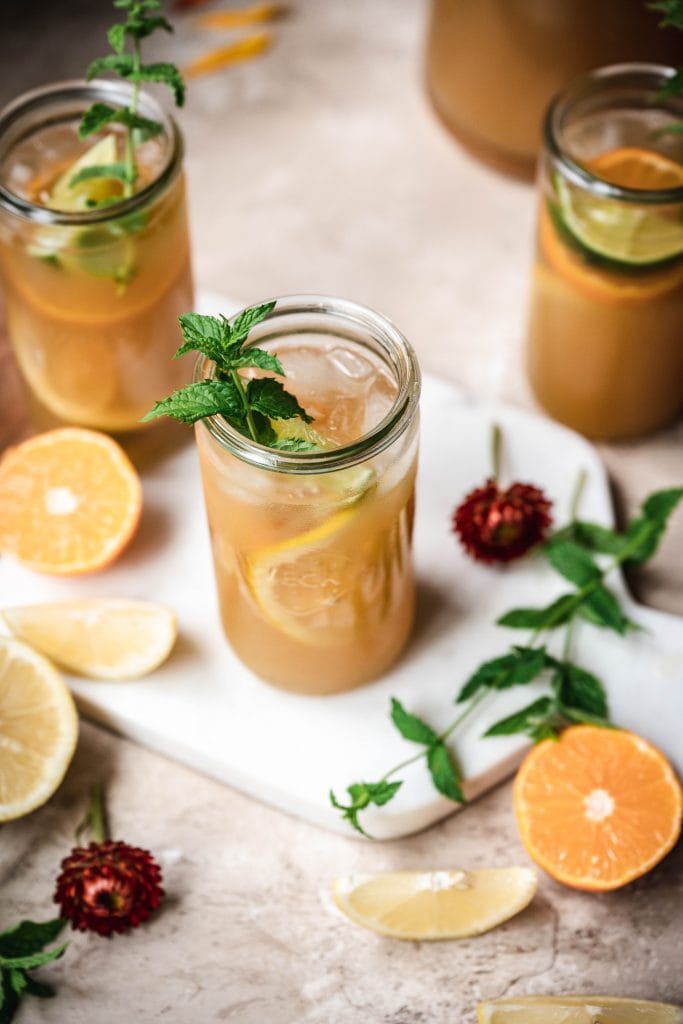 Cola free long island iced tea in tall glass on marble serving platter