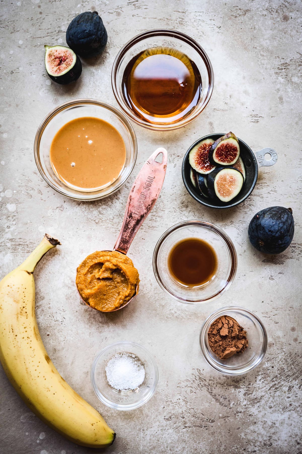 overhead view of toppings for vegan pumpkin peanut butter oatmeal recipe