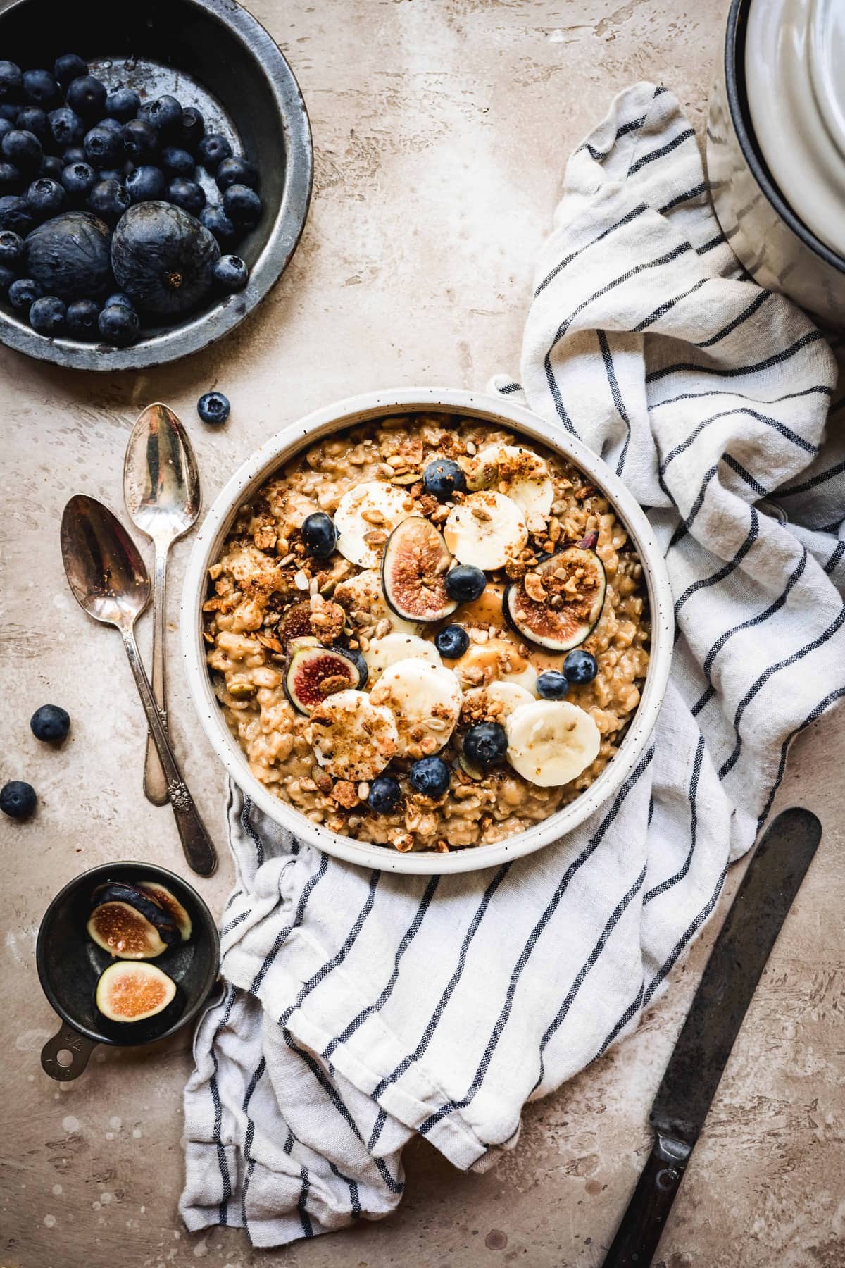 overhead view of pumpkin peanut butter oatmeal in a bowl