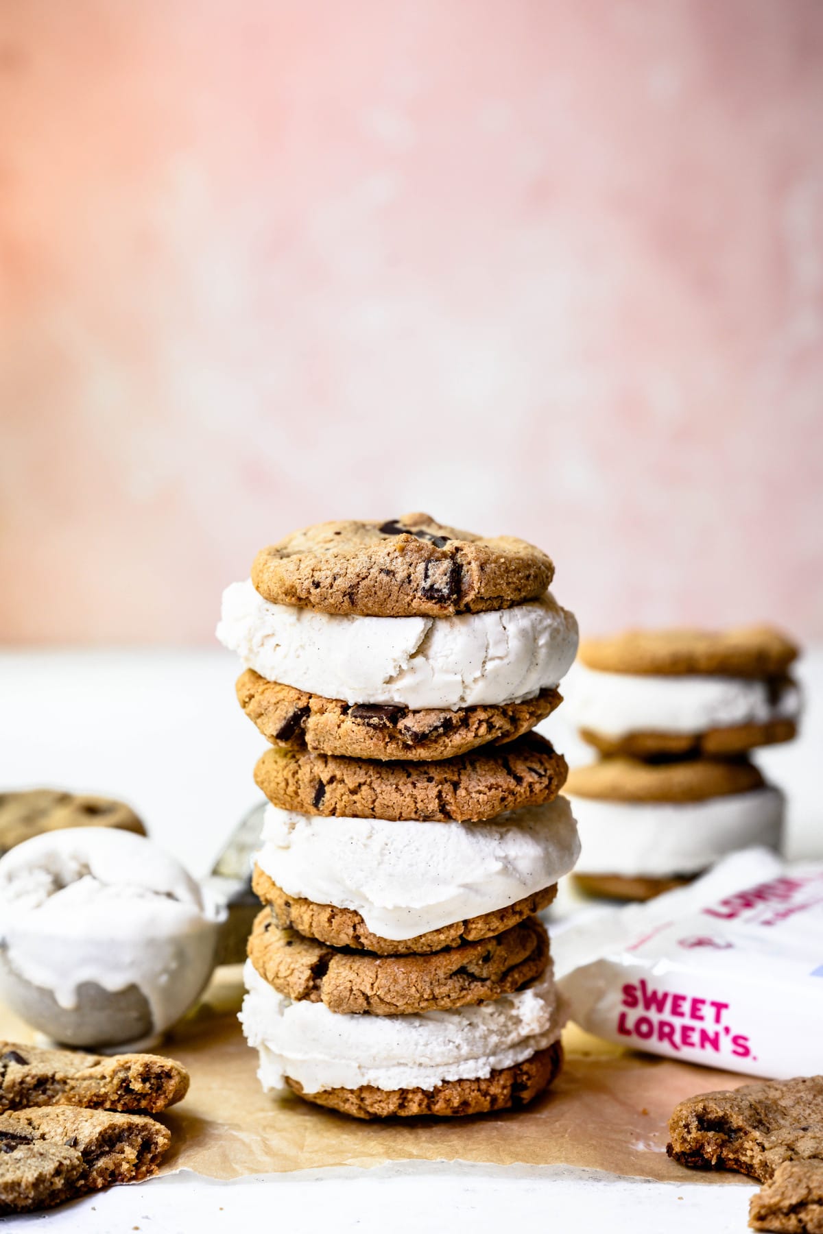 Side view of vegan ice cream sandwiches with pink background