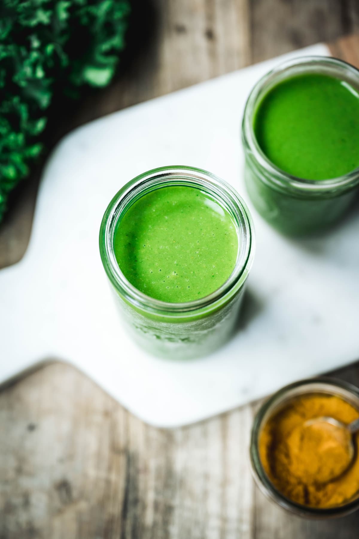 overhead of pineapple cashew protein smoothies for athletes