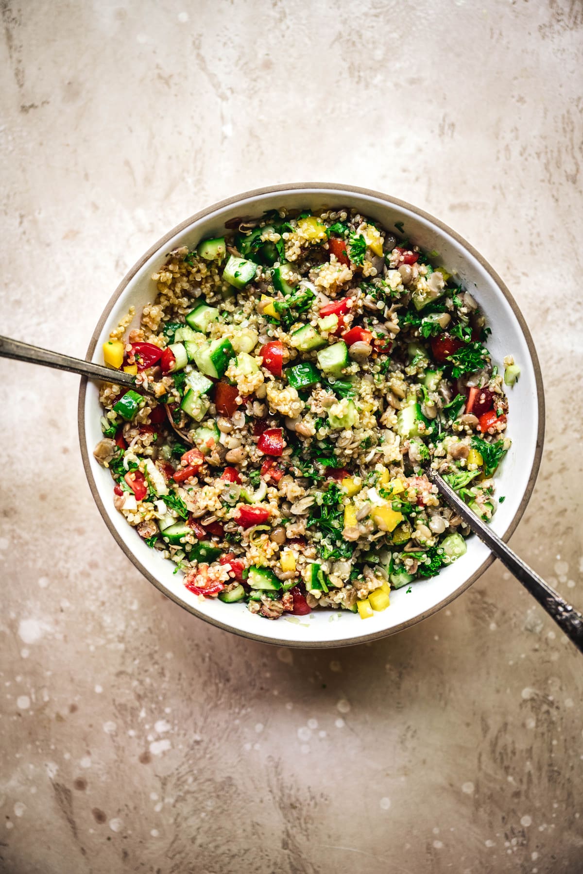 overhead view of mediterranean quinoa salad in bowl