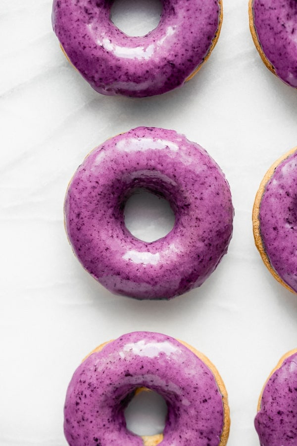 overhead of vegan blueberry glazed doughnuts from choosing chia