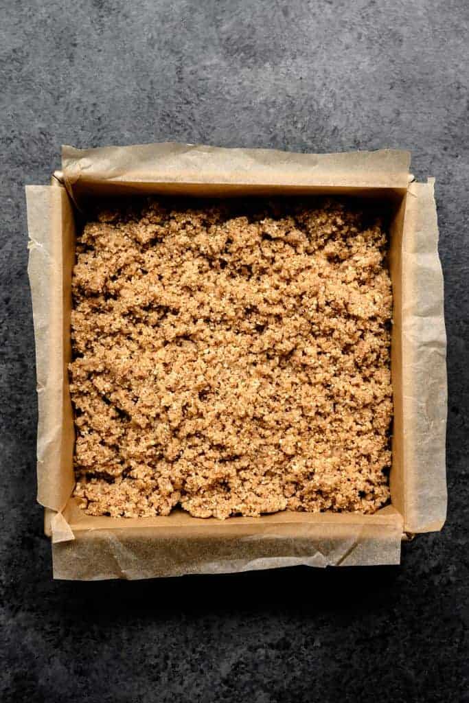 overhead of almond joy filling in a baking sheet 
