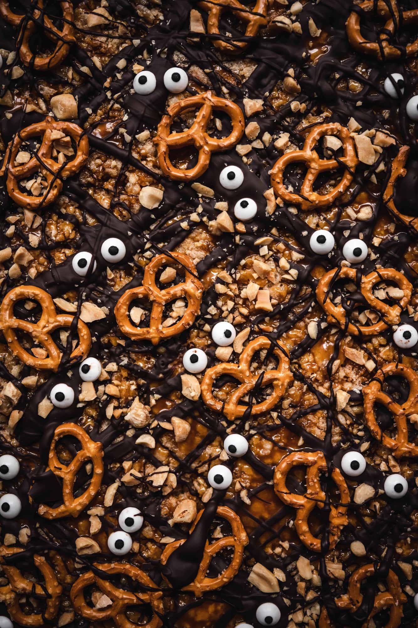 close up overhead of halloween chocolate peanut butter vegan rice krispie treats