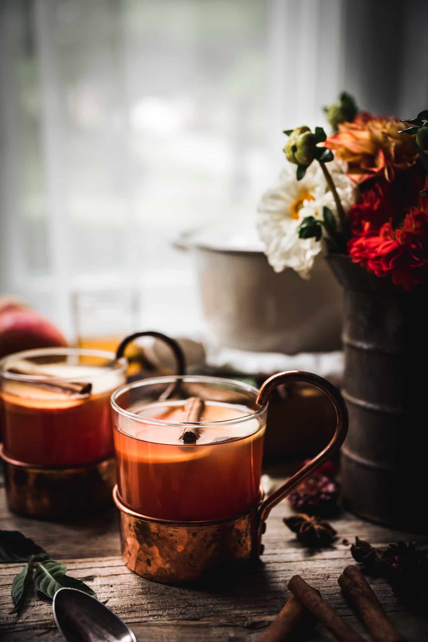 Close up side view of apple cider brandy cocktail