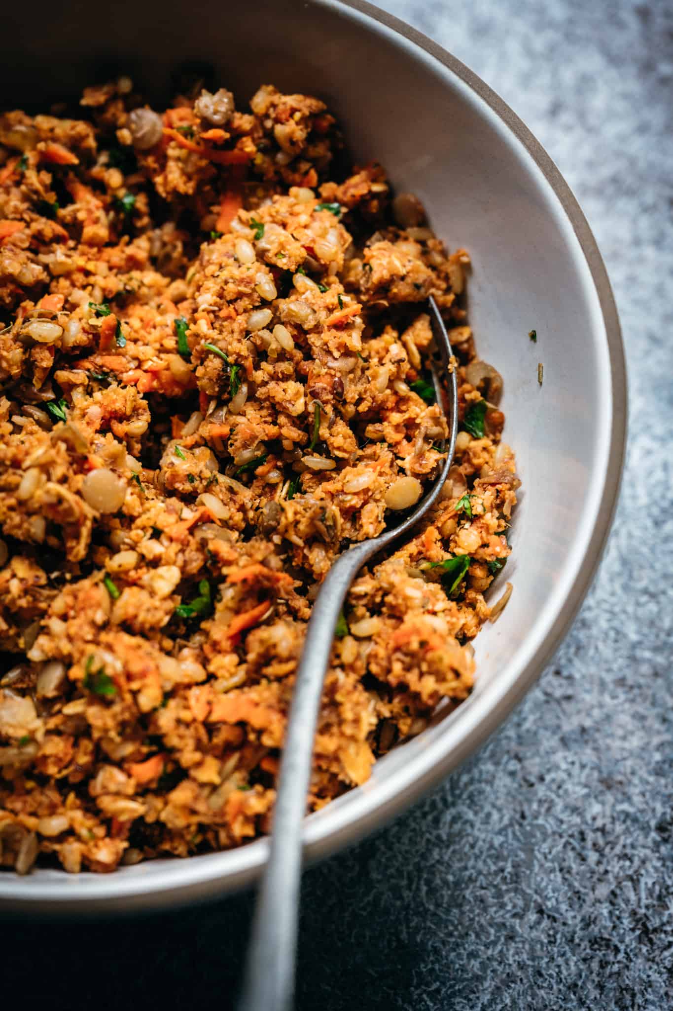 close up 45 degree overhead of vegan lentil meatball mix before it's shaped into balls