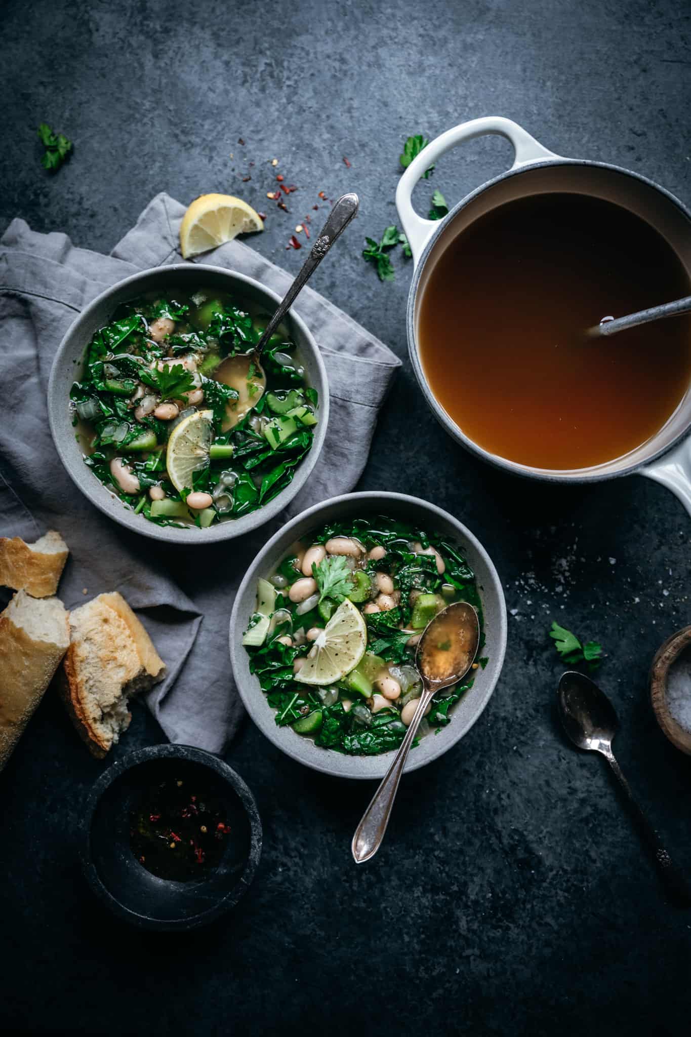 overhead view of green soup with homemade vegetable broth