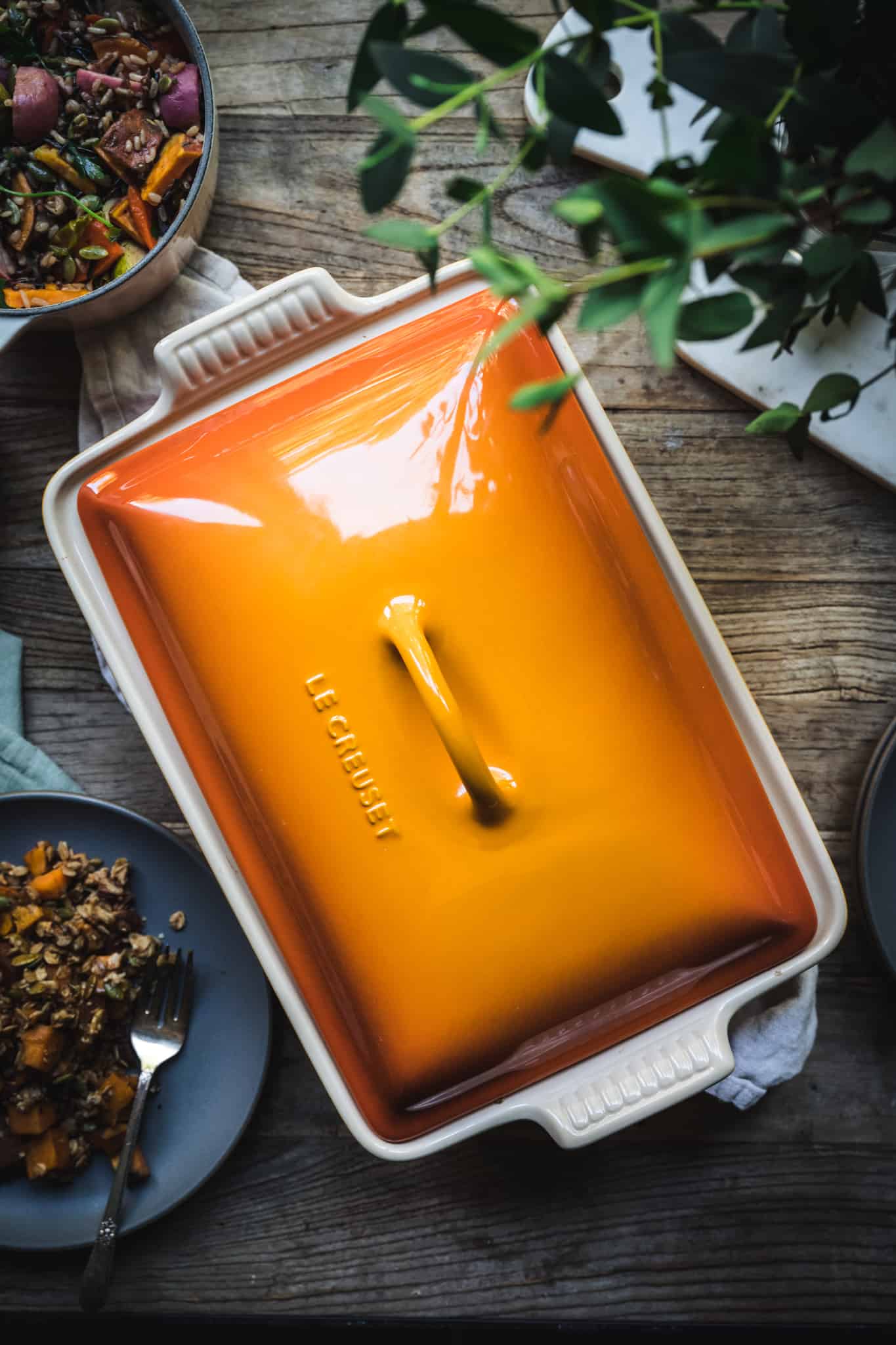 Overhead view of beautiful orange casserole dish from Le Creuset