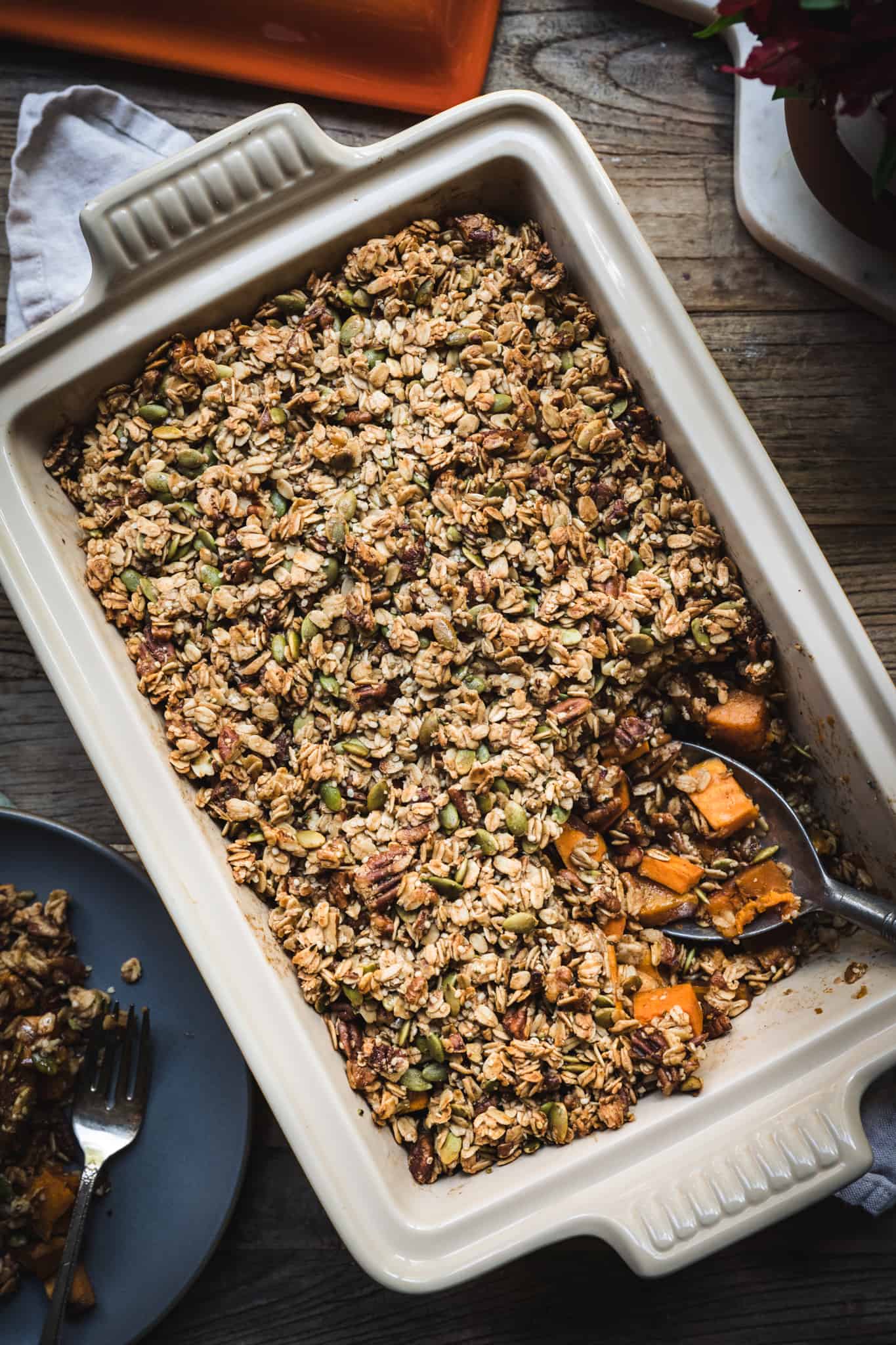 overhead view of healthy vegan sweet potato casserole with granola topping